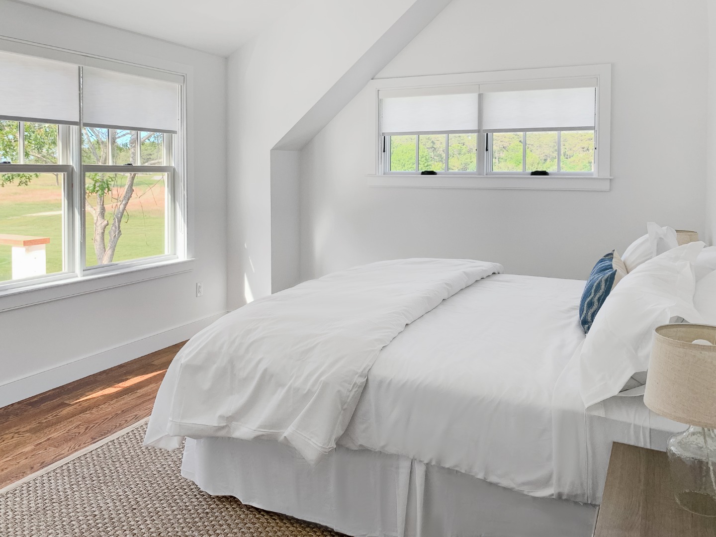 70 Curtis Lane Edgartown, MA 02539 - Photo 18 of 34 a large white bed in a white room