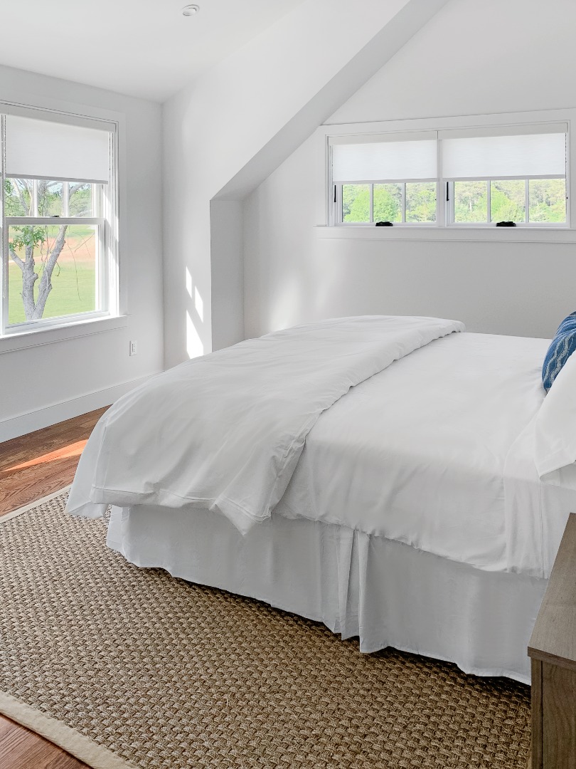 70 Curtis Lane Edgartown, MA 02539 - Photo 19 of 34 a bedroom with a bed and window