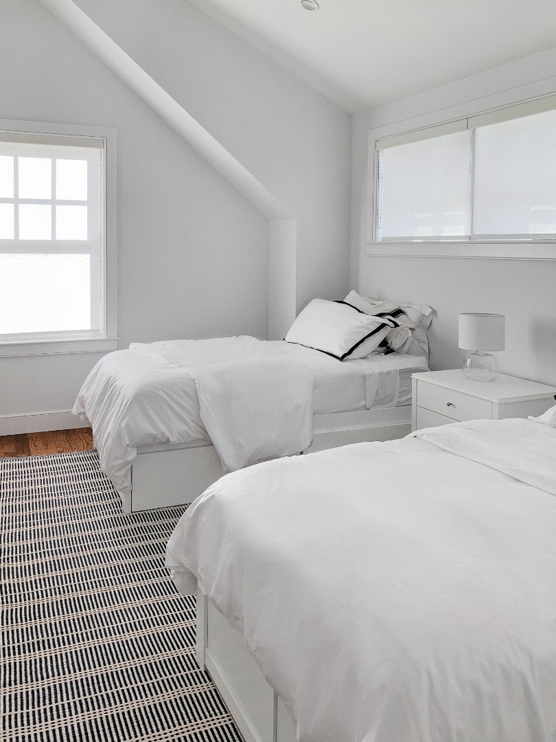 70 Curtis Lane Edgartown, MA 02539 - Photo 22 of 34 a bedroom with two beds and a window