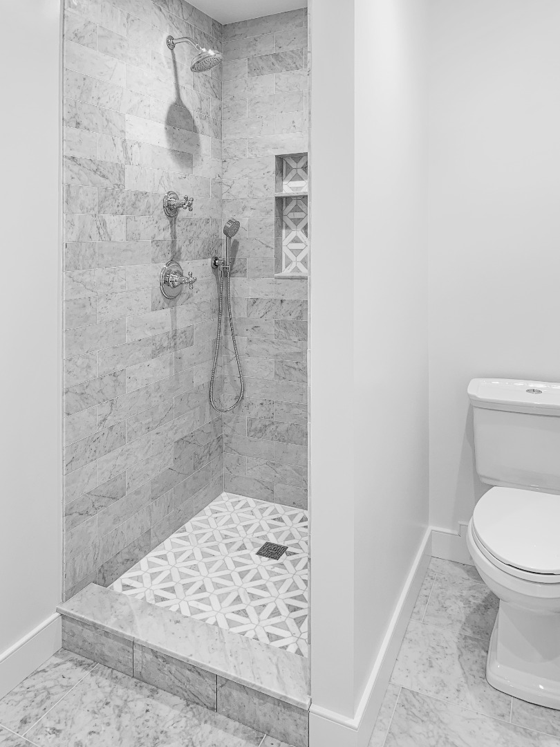 70 Curtis Lane Edgartown, MA 02539 - Photo 24 of 34 a bathroom with a toilet and a shower