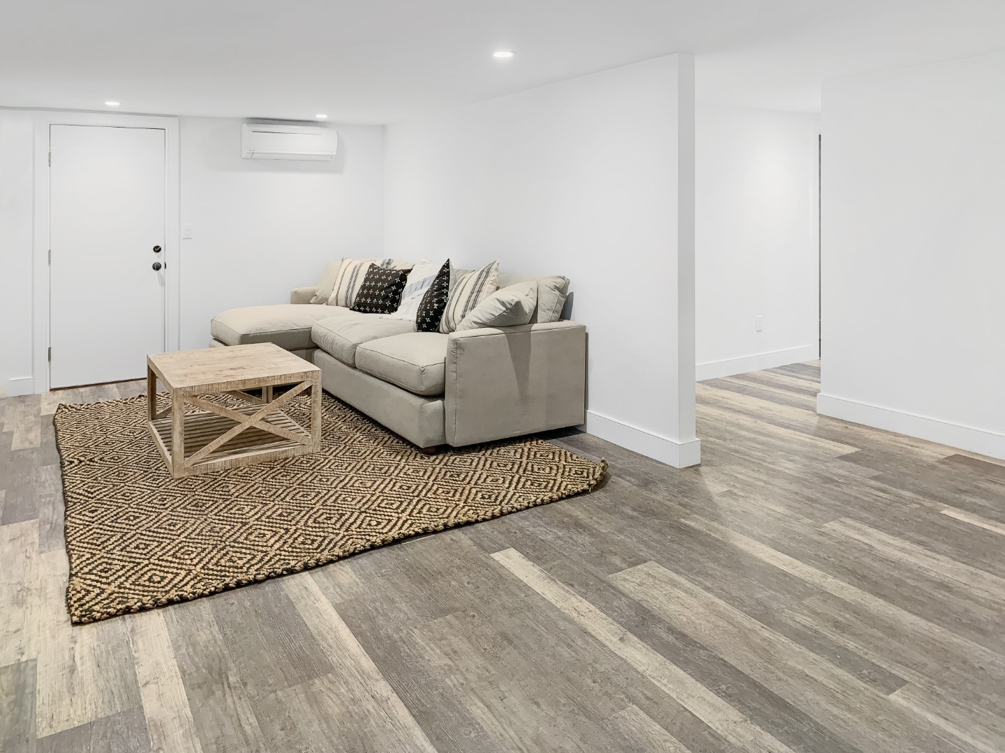 70 Curtis Lane Edgartown, MA 02539 - Photo 29 of 34 a living room with furniture and a wooden floor