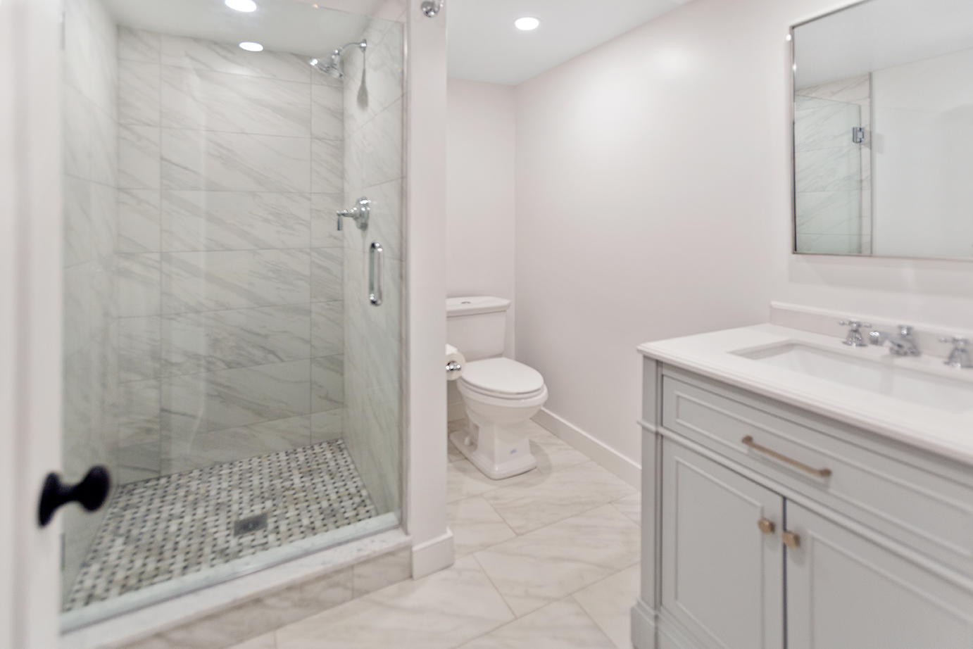 70 Curtis Lane Edgartown, MA 02539 - Photo 30 of 34 a bathroom with a granite countertop sink toilet and shower