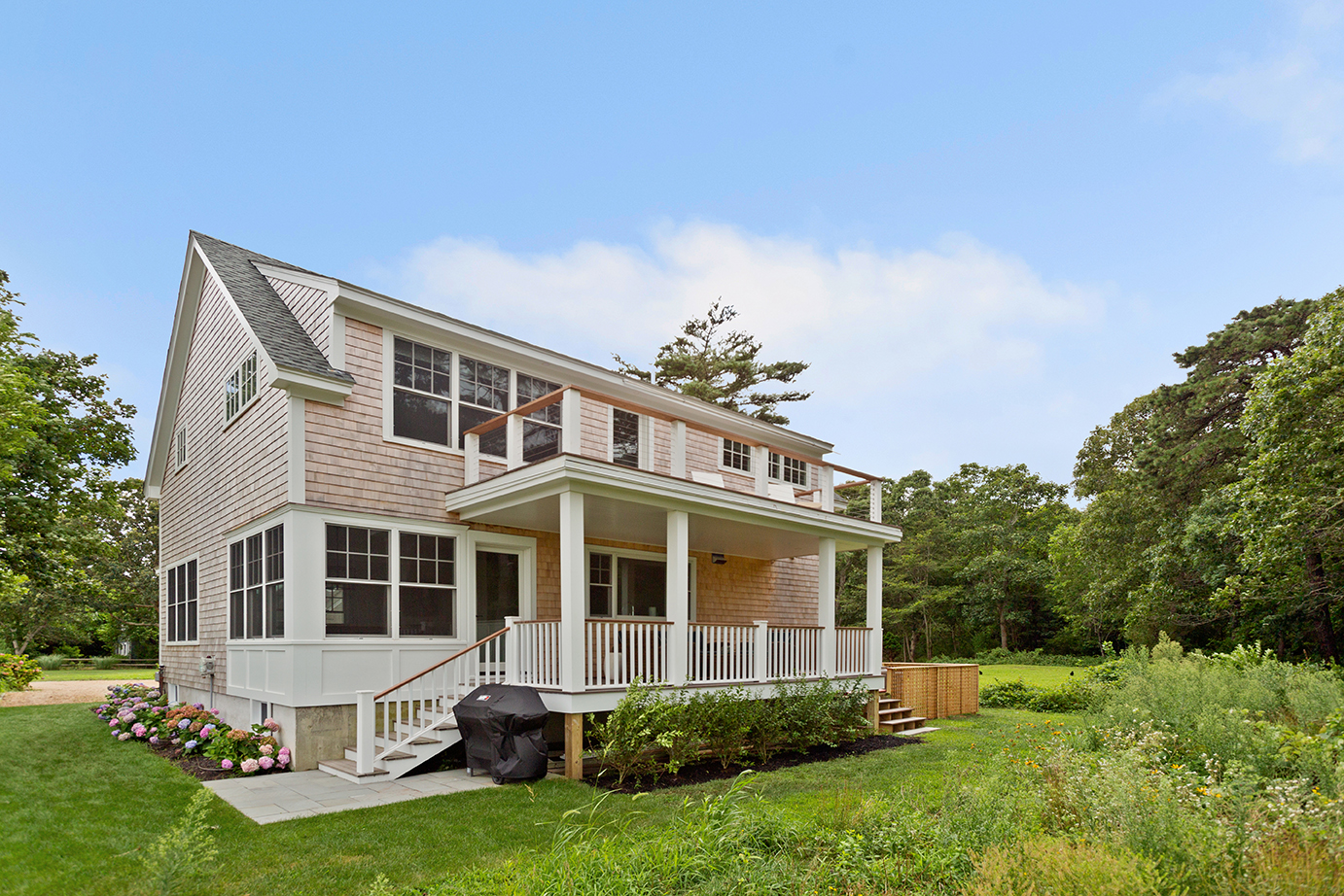 70 Curtis Lane Edgartown, MA 02539 - Photo 31 of 34 front view of a house with a yard