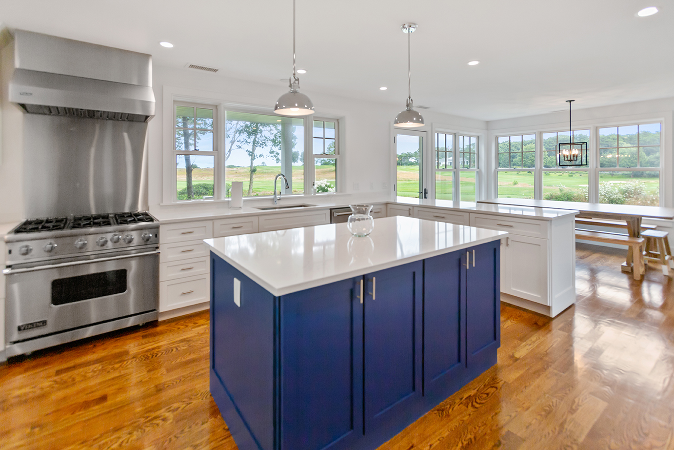 70 Curtis Lane Edgartown, MA 02539 - Photo 8 of 34 a kitchen with kitchen island granite countertop a stove and a sink