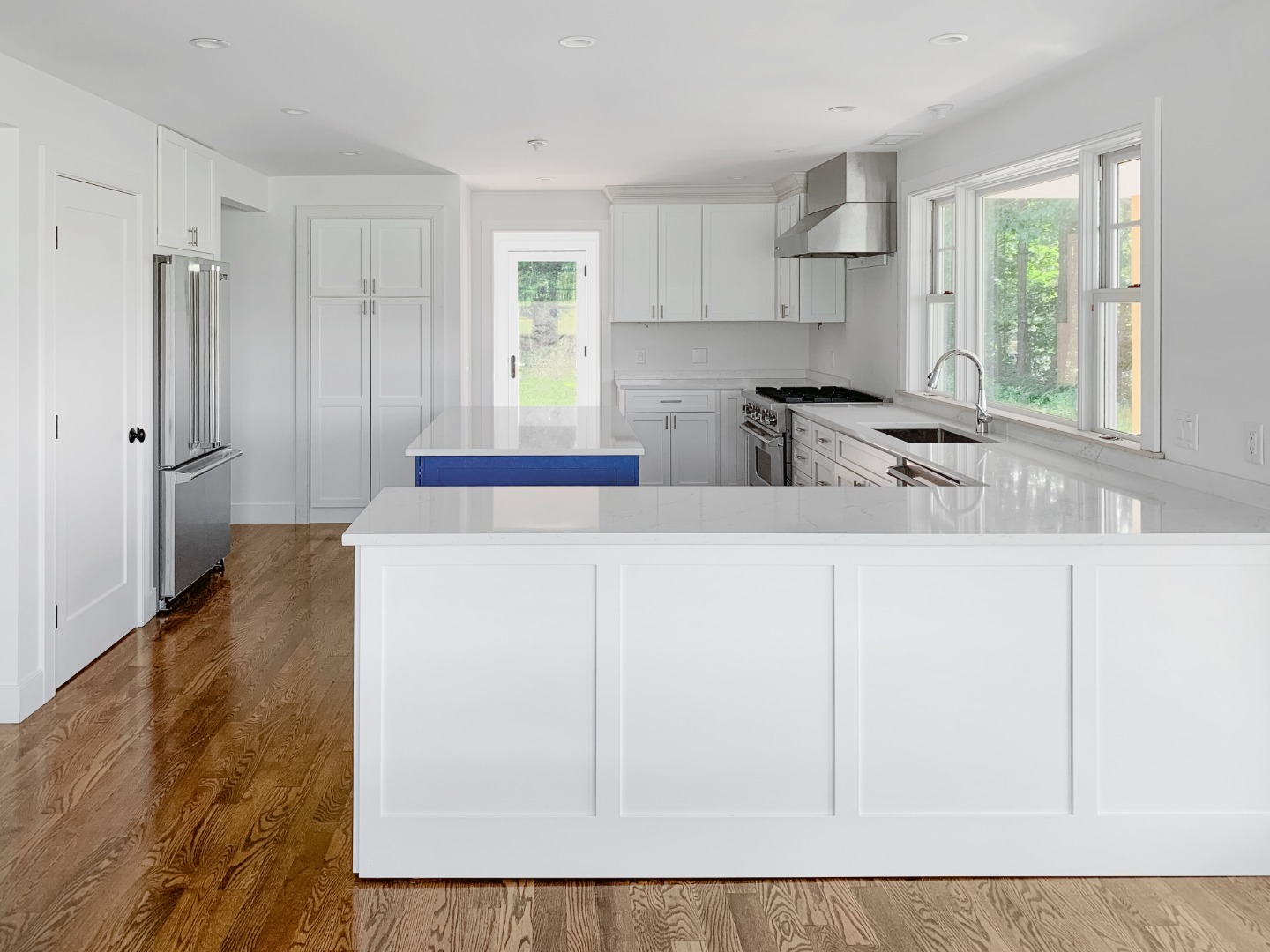 70 Curtis Lane Edgartown, MA 02539 - Photo 9 of 34 a kitchen with stainless steel appliances a refrigerator a sink a stove a microwave and cabinets