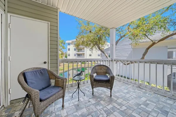 a building outdoor space with patio furniture