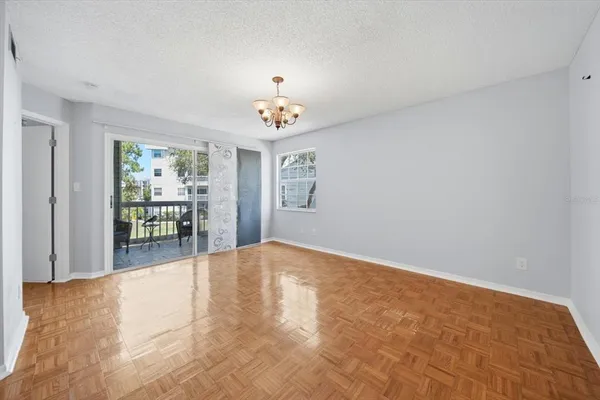 a view of an empty room with a window