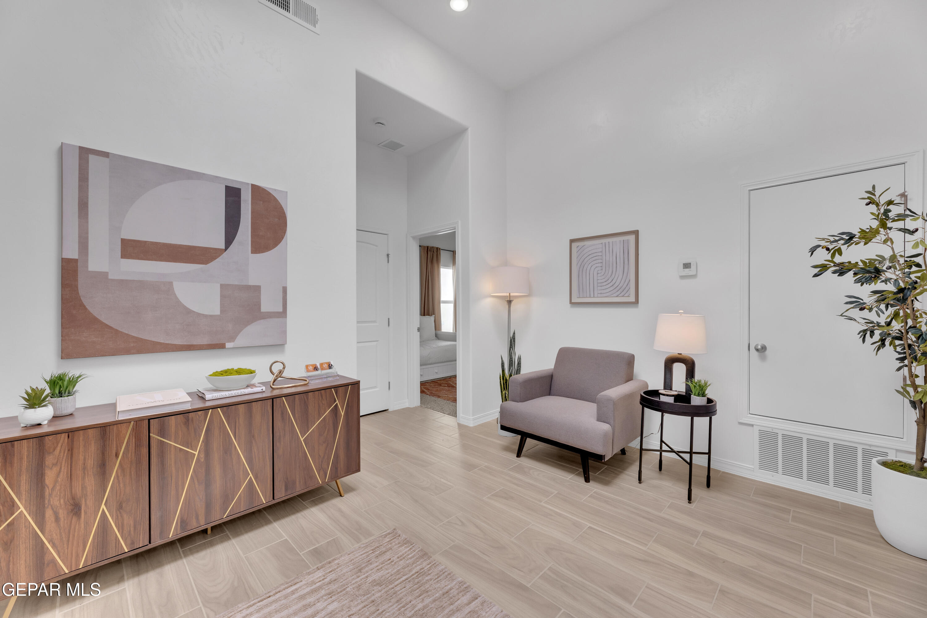 6035 Summer Ridge Santa Teresa, NM 88008 - Photo 6 of 49 a living room with furniture and wooden floor