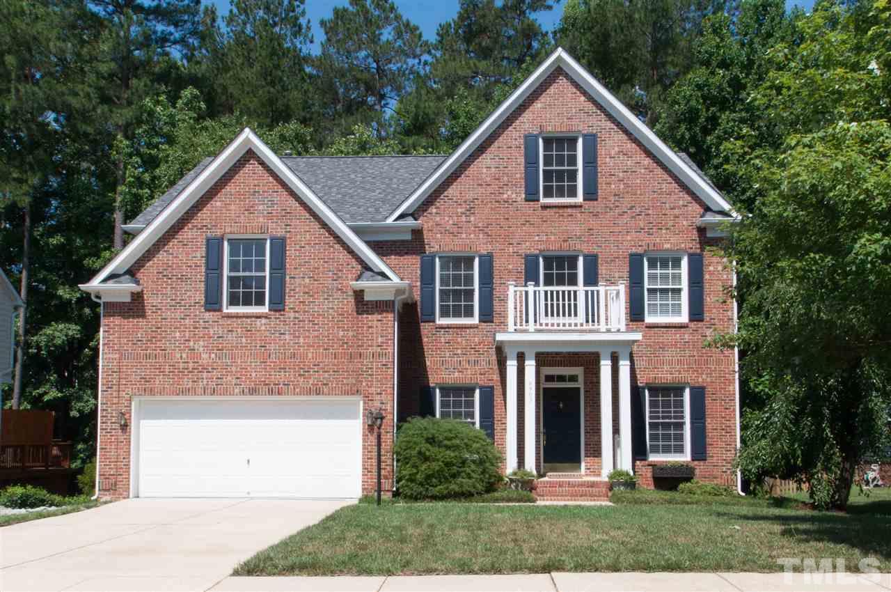 8905 Braceridge Road Raleigh, NC 27613 - Photo 1 of 25 a front view of a house with yard and green space