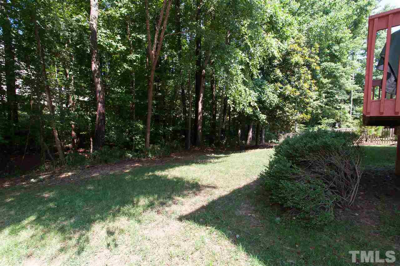 8905 Braceridge Road Raleigh, NC 27613 - Photo 23 of 25 a view of backyard with green space
