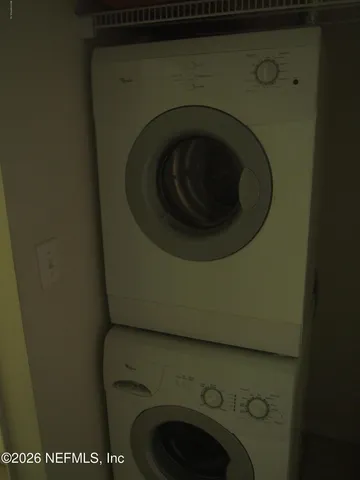 a bathroom with a sink toilet and a mirror