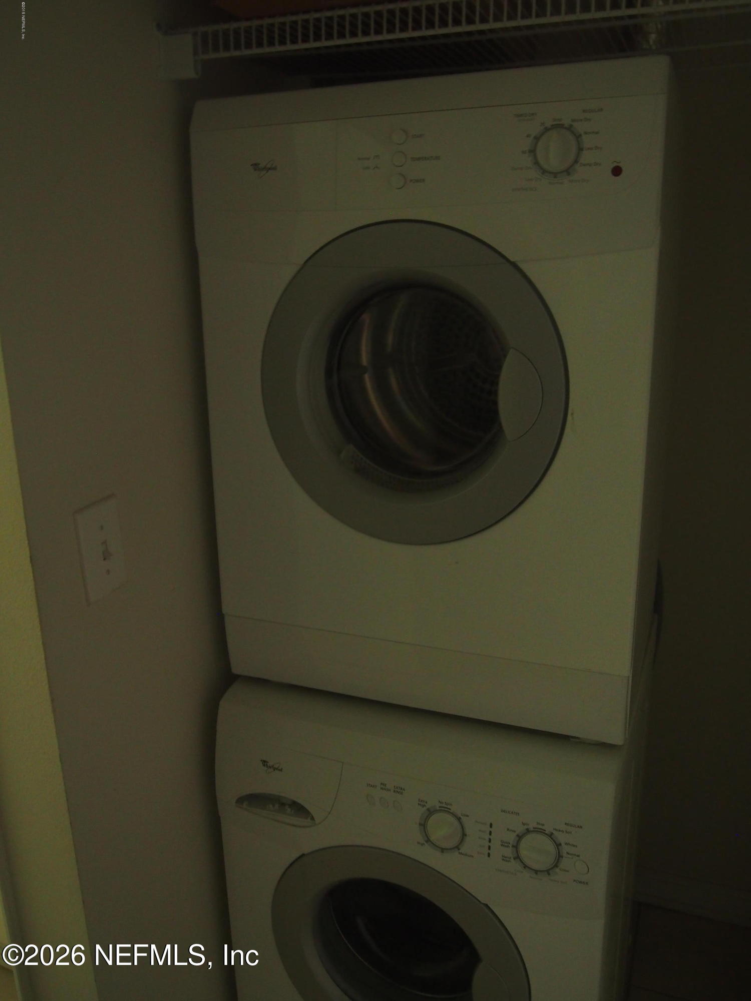7920 Merrill Road, Unit 1412 Jacksonville, FL 32277 - Photo 10 of 12 a utility room with dryer and washer