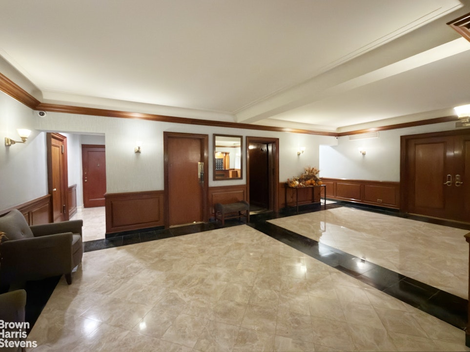 325 East 79th Street, Unit 3E Manhattan, NY 10075 - Photo 11 of 14 a view of a big room with closet and windows