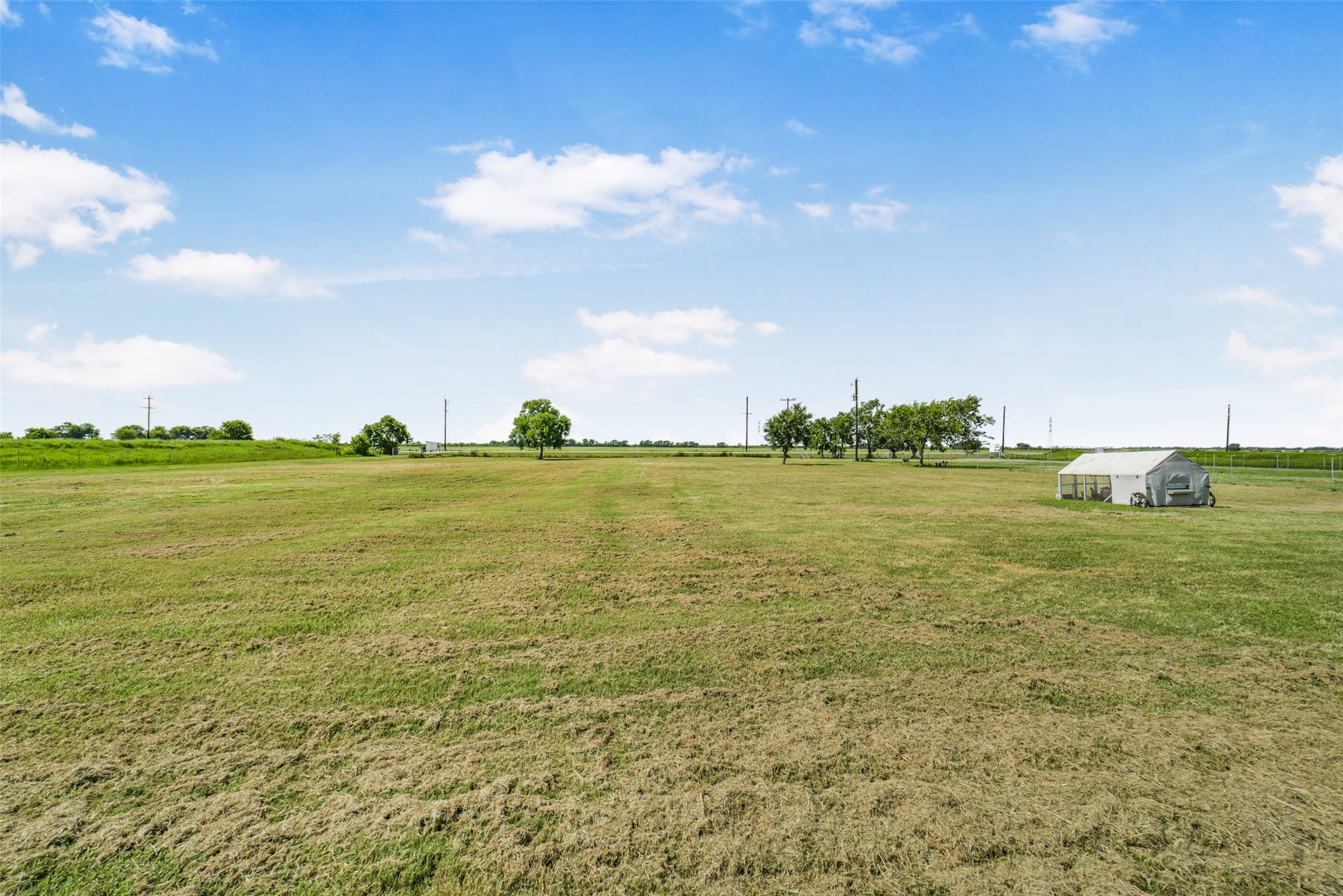 11301 South FM 441 Road El Campo, TX 77437 - Photo 5 of 43 The property features fenced pastures of approximately 5 acres, 2 acres, and 1 acre complete with cross-fencing, 13 gates, and 3 holding pens; with the rest of the space for the home and guest house and other outbuildings, including a farm stand just outside the front gate.