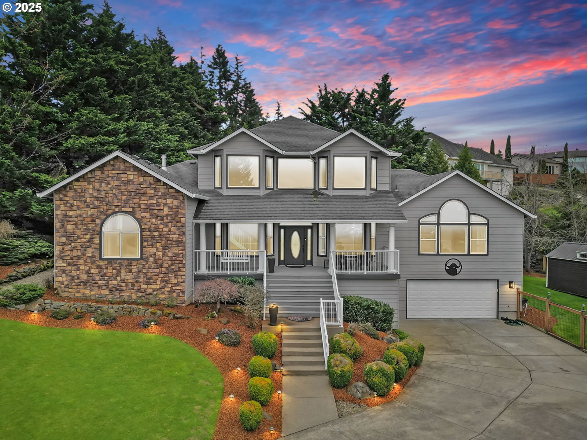 a front view of a house with a yard
