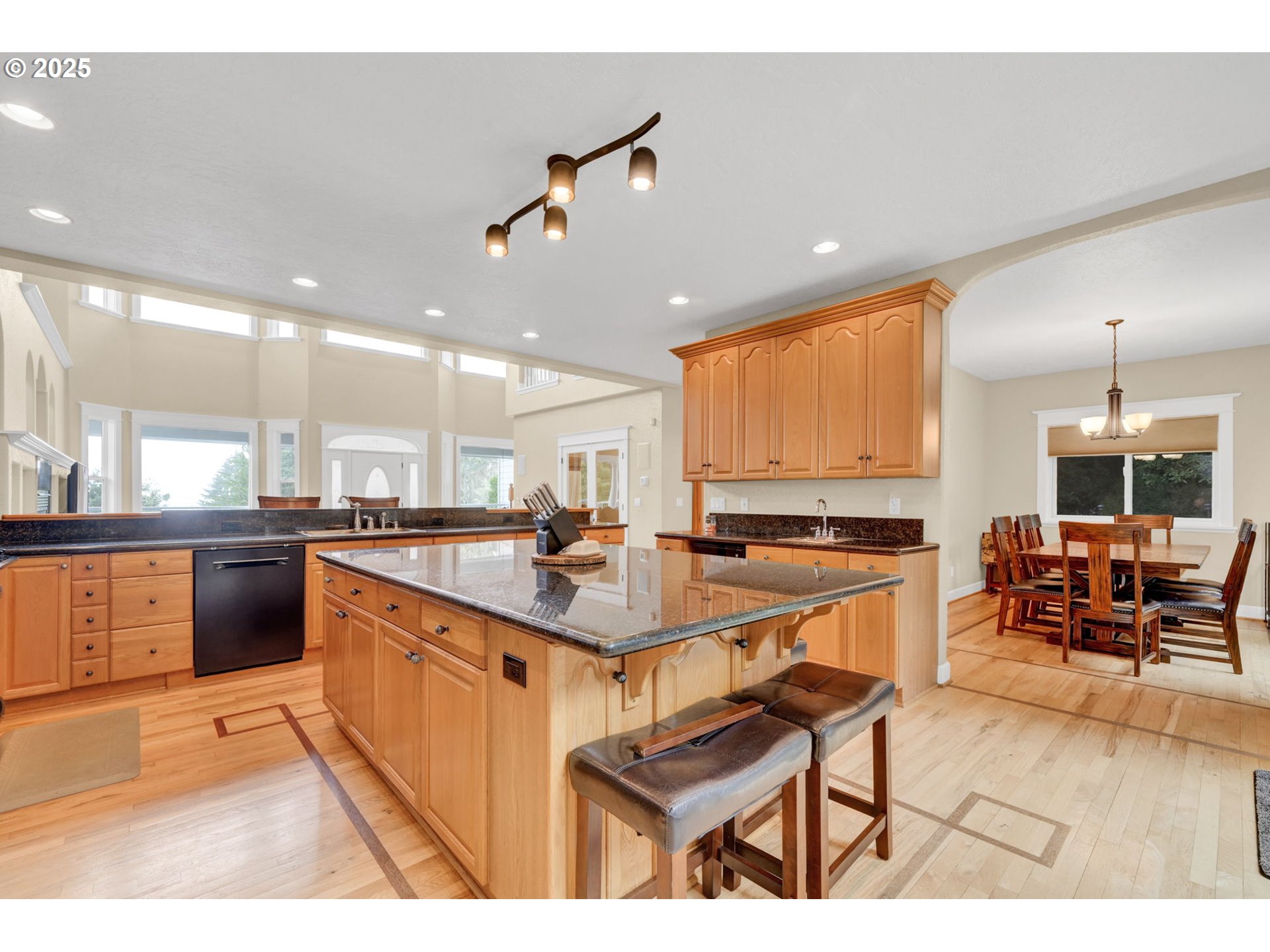 2375 Lasater Boulevard Eugene, OR 97405 - Photo 13 of 46 a kitchen with counter top space appliances and a center island