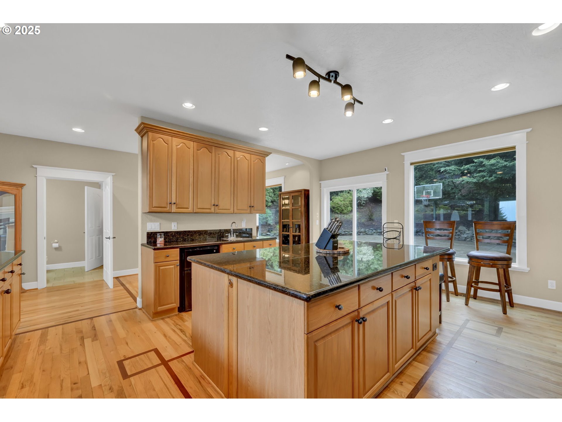 2375 Lasater Boulevard Eugene, OR 97405 - Photo 15 of 46 a kitchen with stainless steel appliances granite countertop a sink and cabinets