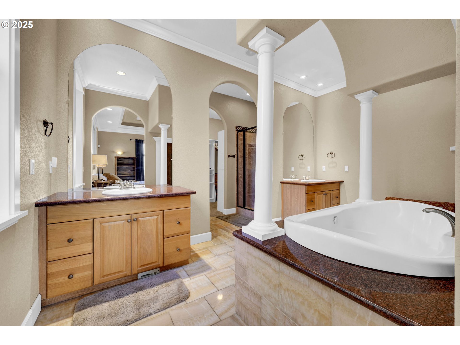 2375 Lasater Boulevard Eugene, OR 97405 - Photo 25 of 46 a spacious bathroom with a granite countertop sink a mirror and a