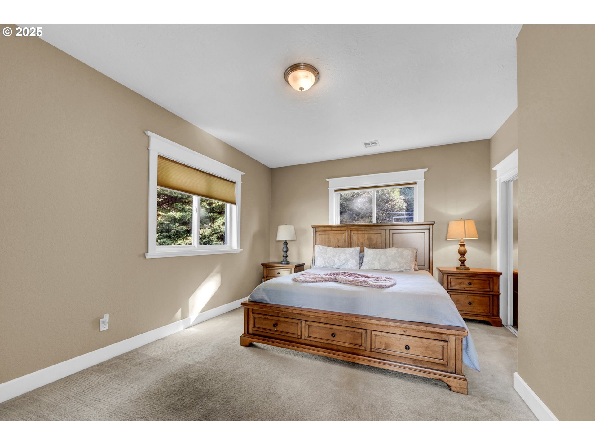 2375 Lasater Boulevard Eugene, OR 97405 - Photo 26 of 46 a bedroom with a bed and a night stand