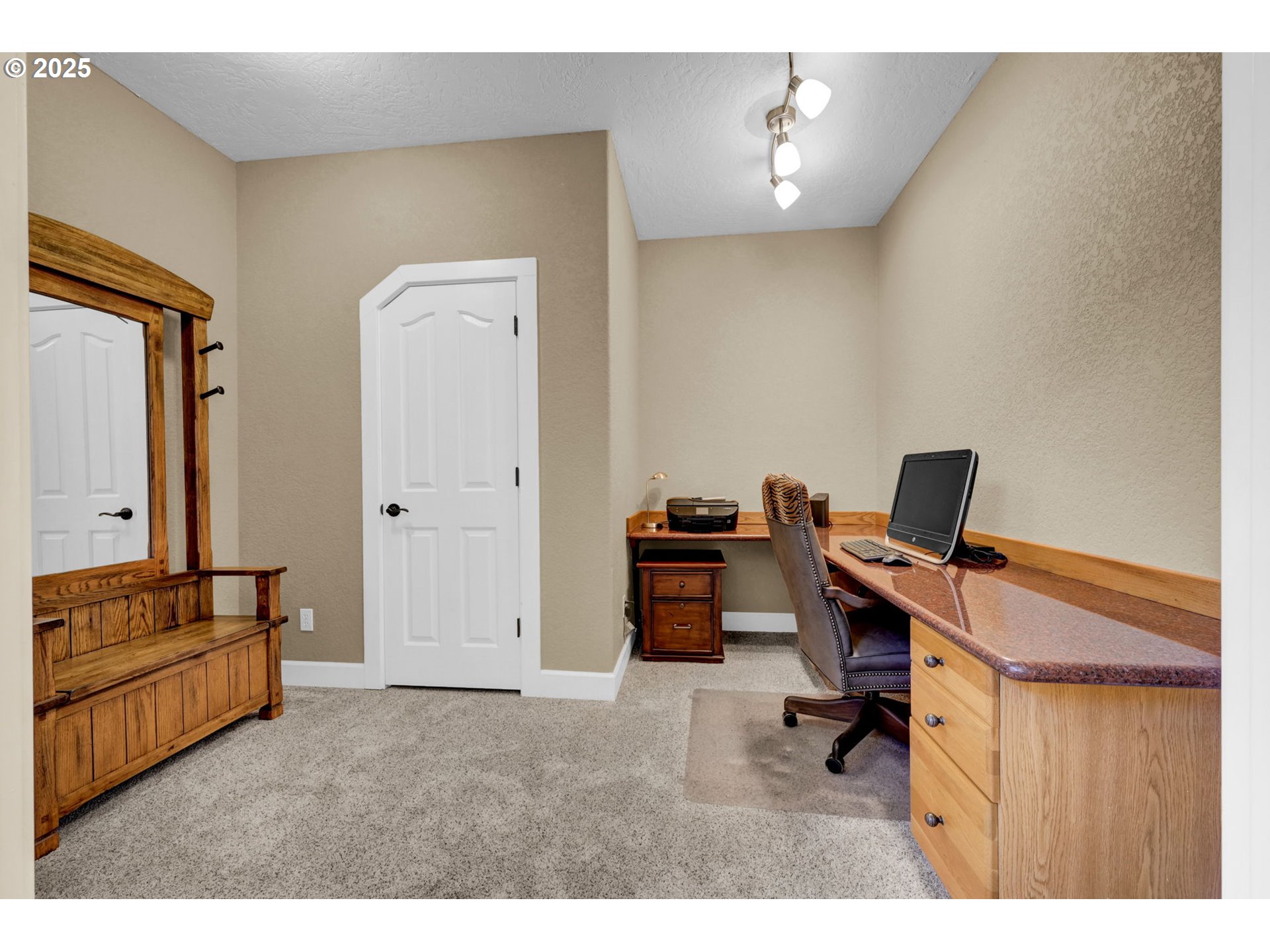 2375 Lasater Boulevard Eugene, OR 97405 - Photo 34 of 46 a view of a workspace with furniture and a window