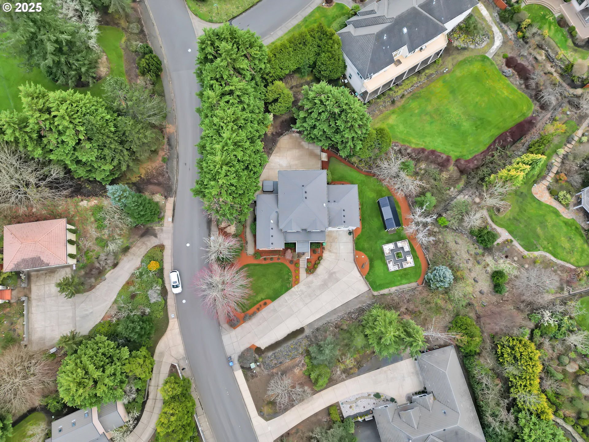 2375 Lasater Boulevard Eugene, OR 97405 - Photo 46 of 46 an aerial view of a house with a yard and garden