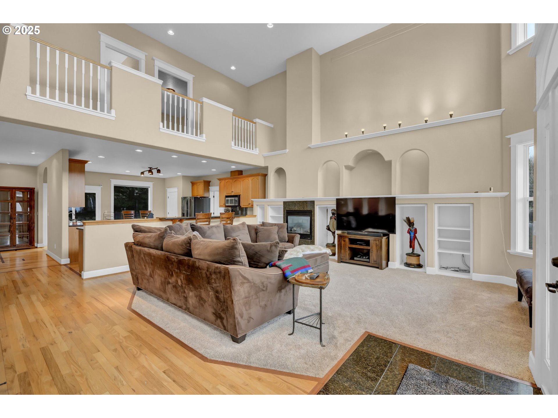 2375 Lasater Boulevard Eugene, OR 97405 - Photo 6 of 46 a living room with fireplace furniture and a kitchen view