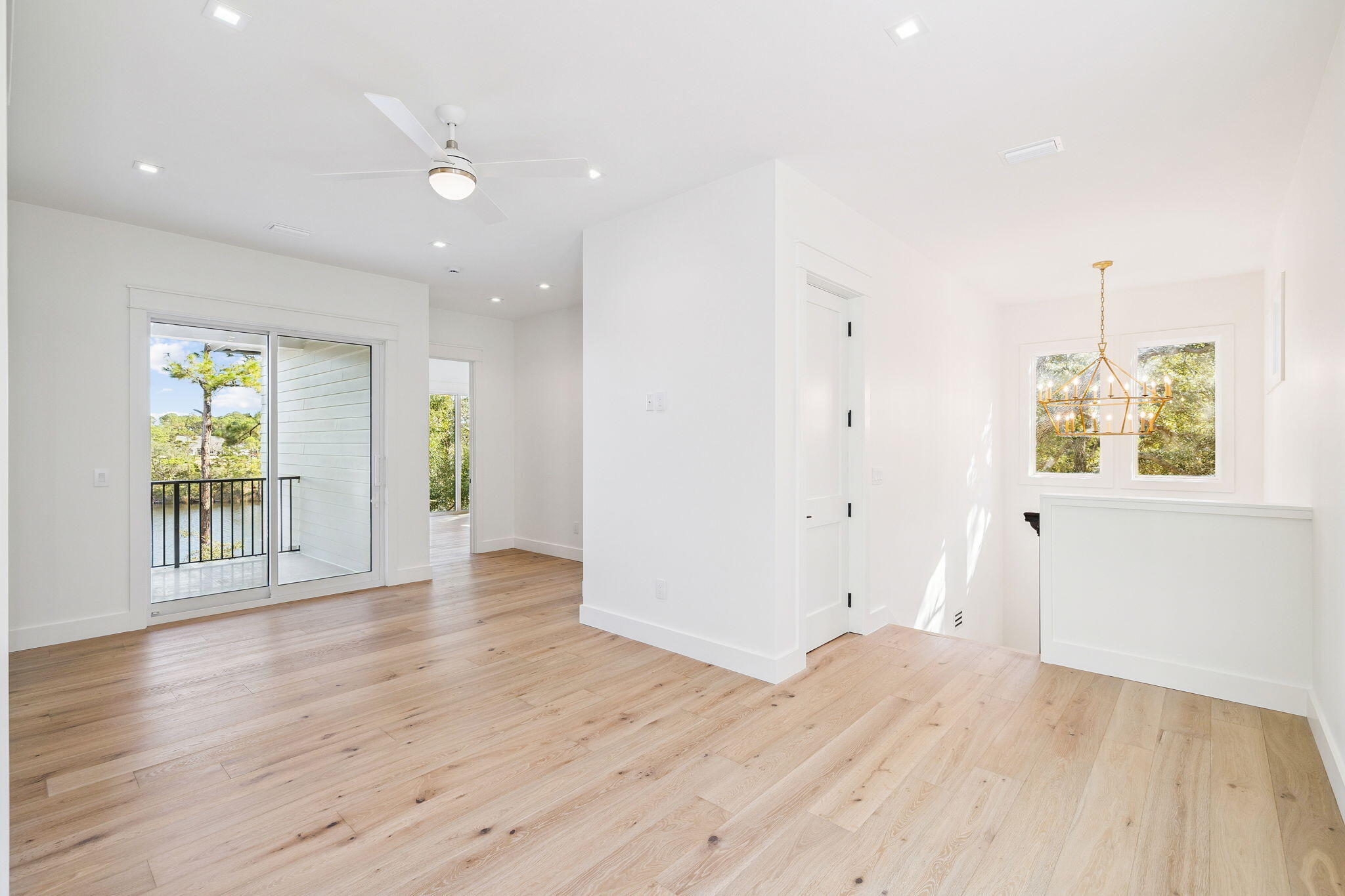 672 North Walton Lakeshore Dr Inlet Beach Inlet Beach, FL 32461 - Photo 54 of 88 an empty room with wooden floor and windows
