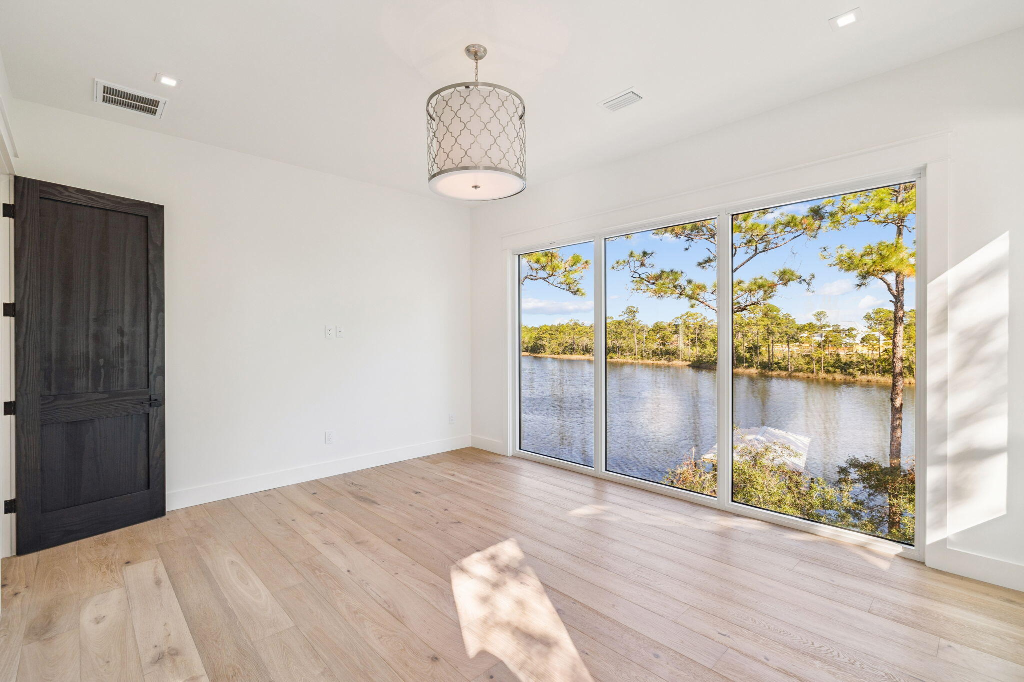 672 North Walton Lakeshore Dr Inlet Beach Inlet Beach, FL 32461 - Photo 57 of 88 a view of a room with window and hardwood floor