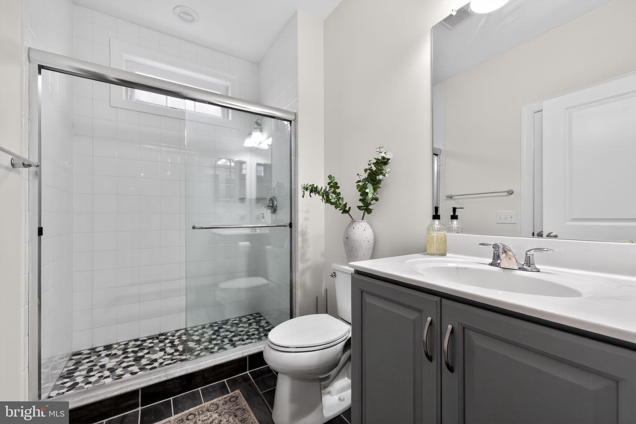 1036 Matthew Way New Castle, DE 19720 - Photo 26 of 64 a bathroom with a sink toilet and shower