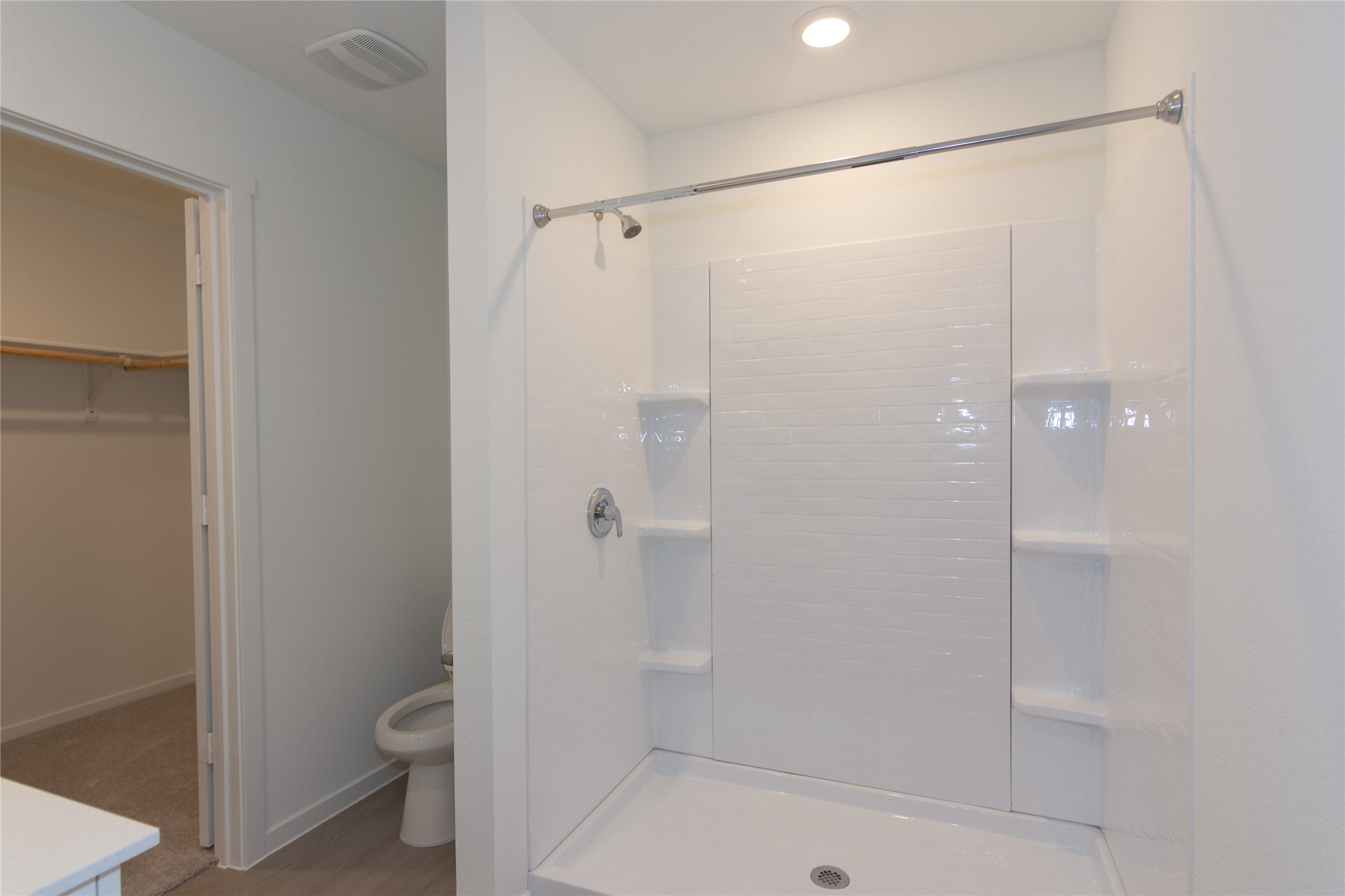 149 Star Packer Lane Jarrell, TX 76537 - Photo 16 of 30 A well-appointed shower stall, bright and ready for daily use.