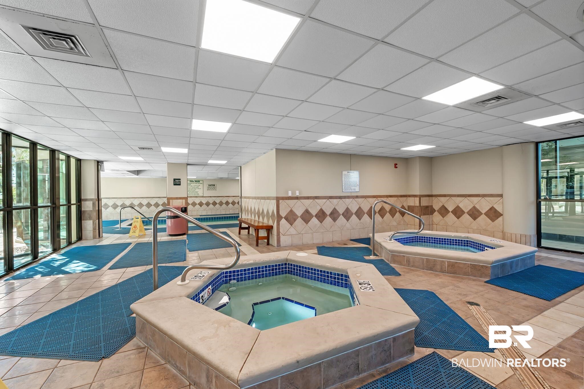 27580 Canal Road, Unit 1214 AND BOAT SLIP #62 Orange Beach, AL 36561 - Photo 49 of 67 View of swimming pool with an indoor hot tub