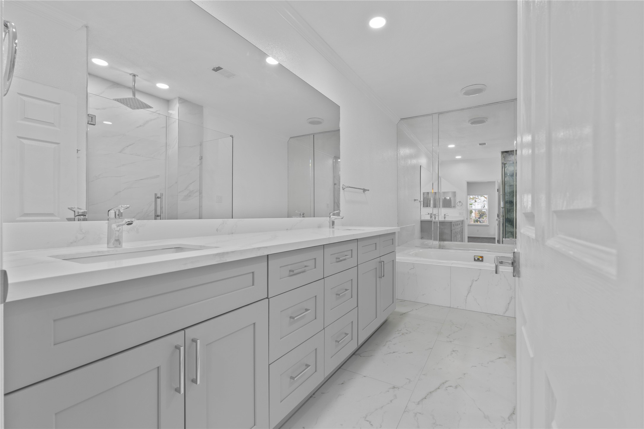 6000 Reims Road, Unit 2005 Houston, TX 77036 - Photo 19 of 28 a spacious bathroom with a granite countertop sink a toilet a mirror and shower