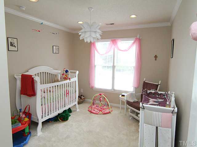 9805 Goodrum Court Raleigh, NC 27617 - Photo 11 of 17 One of the bedroom used as a baby nursery....AHHHHHH! A room of just beginning a new life.