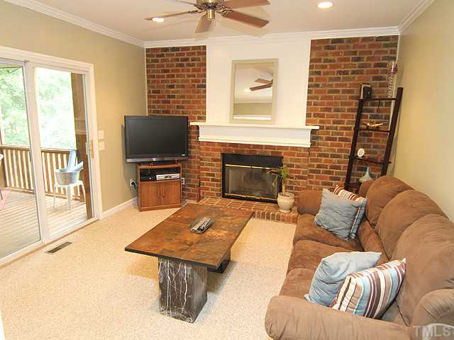 9805 Goodrum Court Raleigh, NC 27617 - Photo 6 of 17 The warmth of this room is just waiting for a family gathering...I can hear the laughter and the sharing of the stories.
