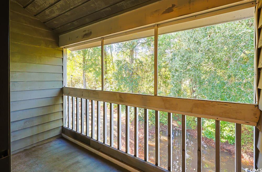4840 Moss Creek Loop, Unit 3 Murrells Inlet, SC 29576 - Photo 15 of 40 Unfurnished sunroom with vaulted ceiling