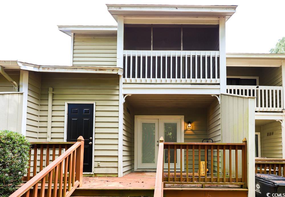 4840 Moss Creek Loop, Unit 3 Murrells Inlet, SC 29576 - Photo 30 of 40 Back of house featuring a balcony and a wooden deck