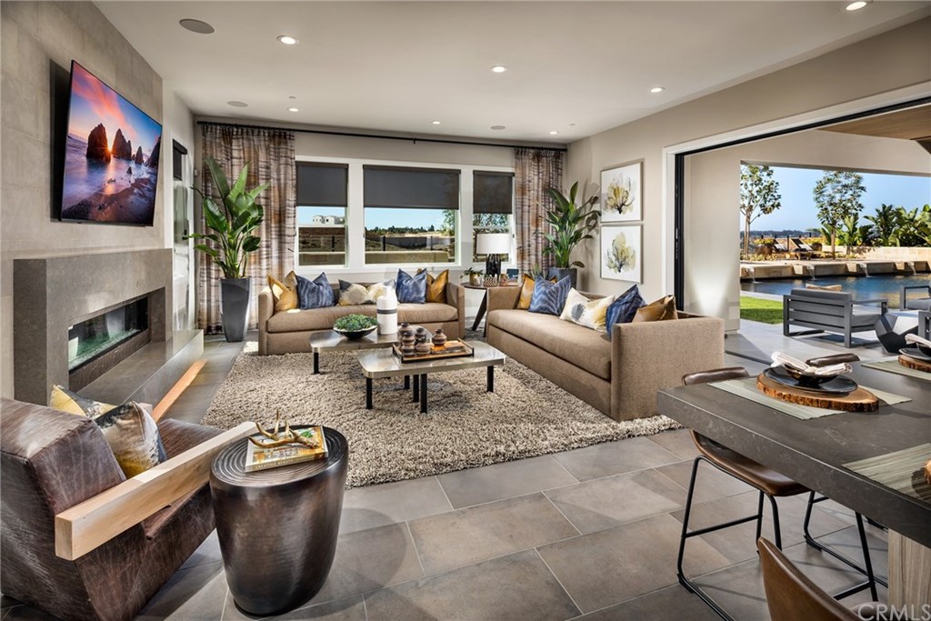 6159 Summit Crest Circle San Diego, CA 92130 - Photo 3 of 7 Family Room. Home is still under construction, photos of model home not actual home for sale.