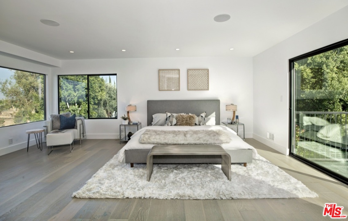 3712 Berry Drive Studio City, CA 91604 - Photo 13 of 50 a bed sitting in a bedroom next to a window