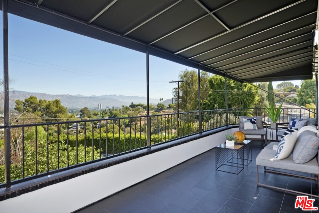 3712 Berry Drive Studio City, CA 91604 - Photo 19 of 50 a view of sitting area with furniture and floor to ceiling window
