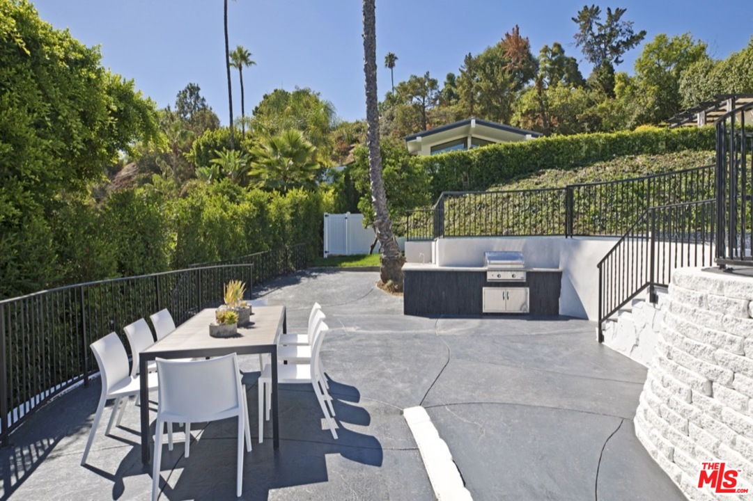 3712 Berry Drive Studio City, CA 91604 - Photo 20 of 50 a view of a chairs and table in the roof deck
