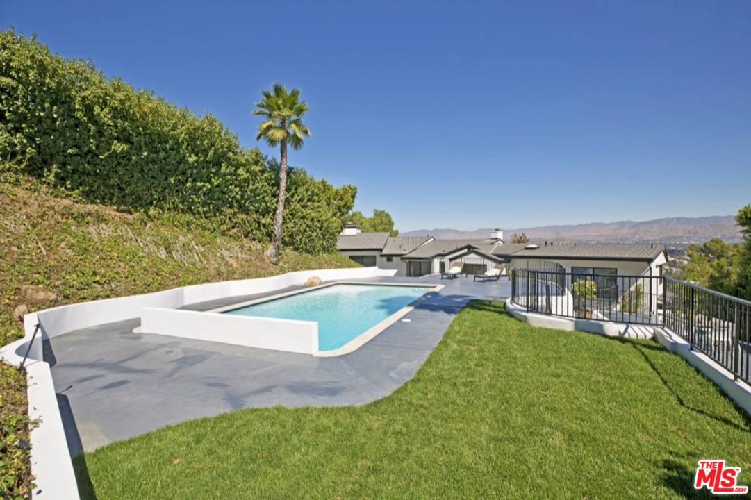 3712 Berry Drive Studio City, CA 91604 - Photo 22 of 50 a view of a house with a backyard porch and sitting area