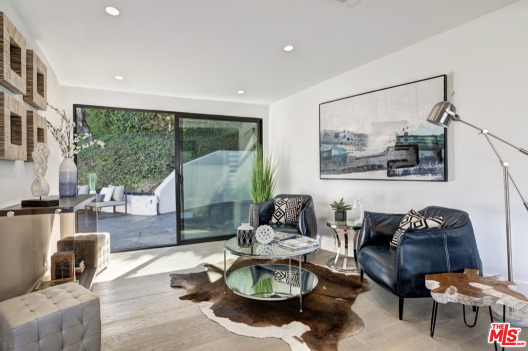 3712 Berry Drive Studio City, CA 91604 - Photo 37 of 50 a living room with furniture and a large window