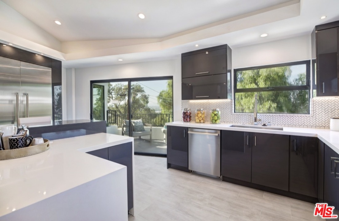 3712 Berry Drive Studio City, CA 91604 - Photo 38 of 50 a large kitchen with kitchen island a large window in it