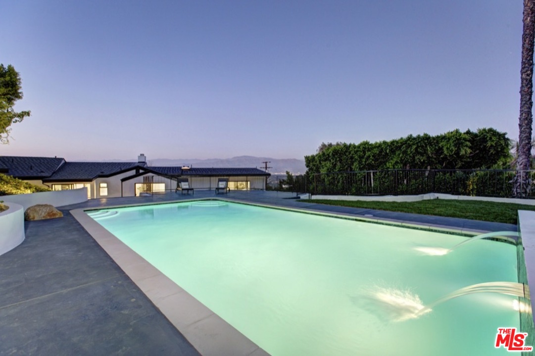 3712 Berry Drive Studio City, CA 91604 - Photo 43 of 50 a view of a swimming pool with a yard and sitting area