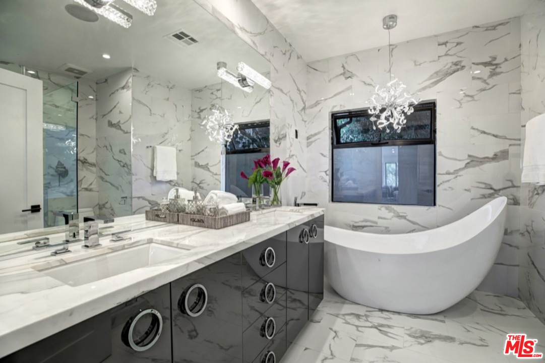 3712 Berry Drive Studio City, CA 91604 - Photo 10 of 50 a bathroom with a bathtub sink and mirror