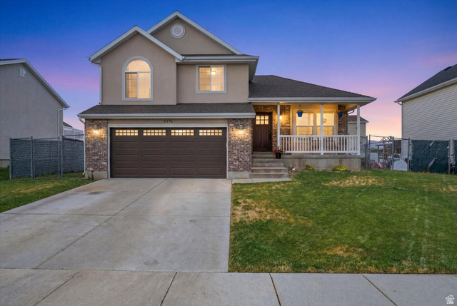 5576 South 4100th Street West Roy, UT 84067 - Photo 1 of 35 Contemporary multi-level home with porch
