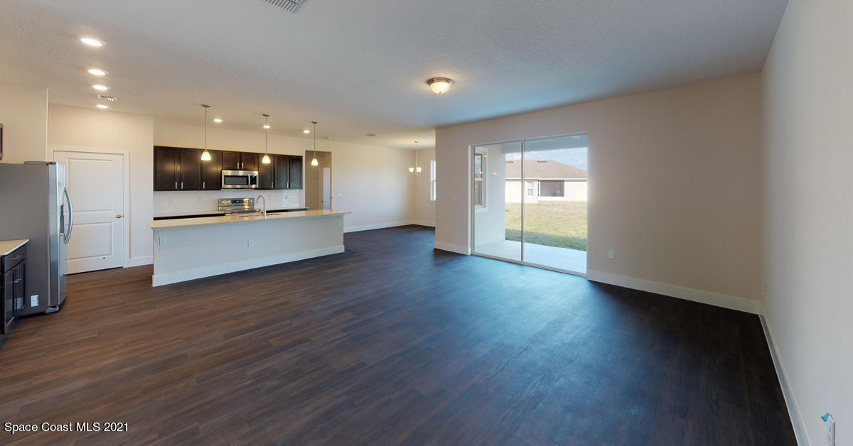 571 Town Road Southwest Palm Bay, FL 32908 - Photo 15 of 18 Brite-2149-Living-Room-edited