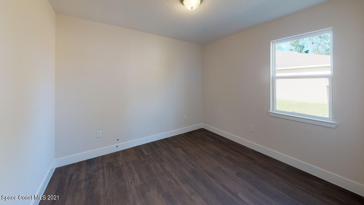 571 Town Road Southwest Palm Bay, FL 32908 - Photo 4 of 18 Brite-2149-Bedroom-2