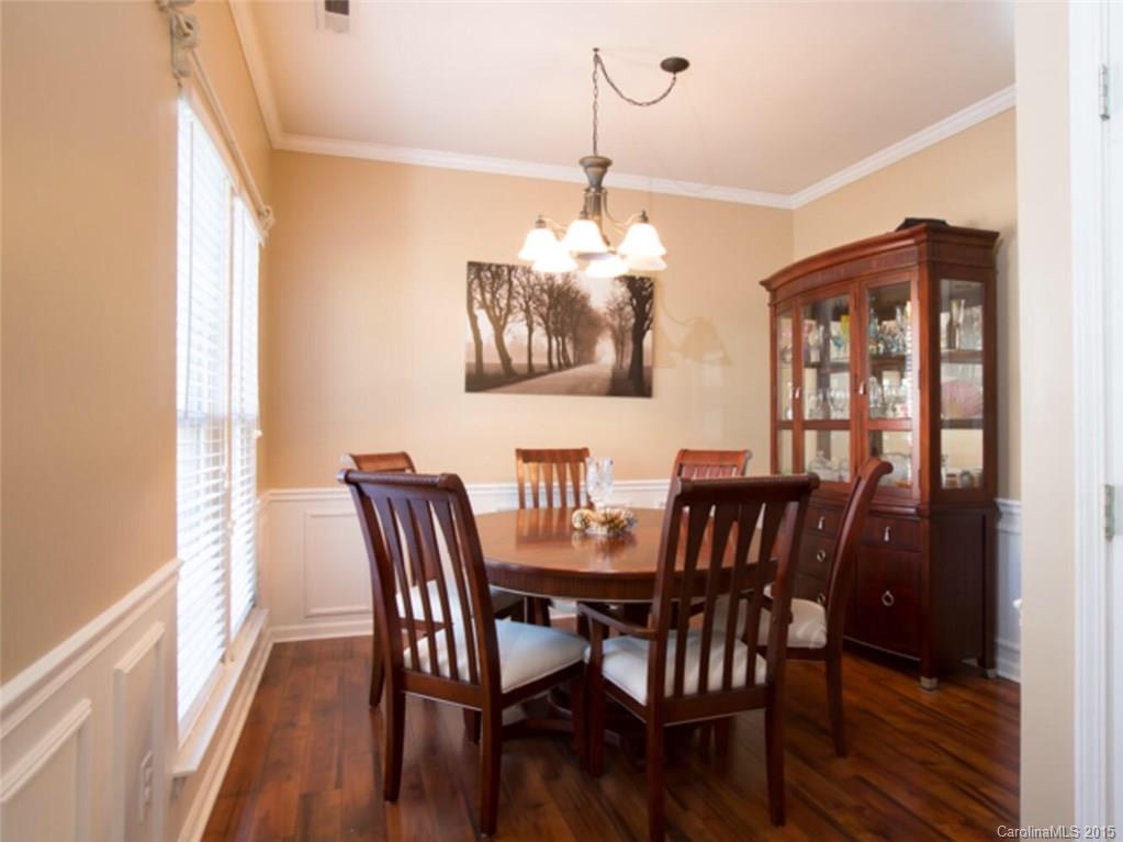 866 Knightsbridge Road Fort Mill, SC 29708 - Photo 3 of 19 a view of a dining room with furniture window and wooden floor