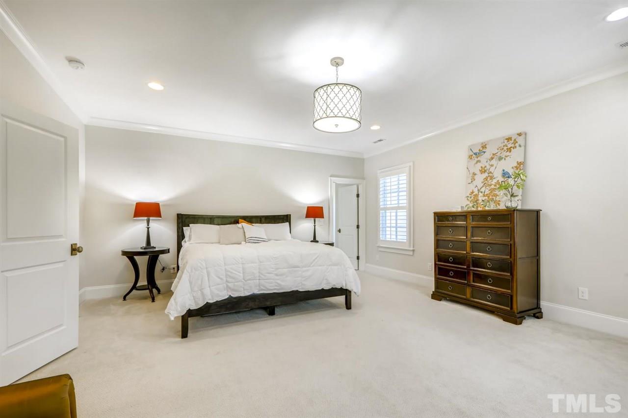 2827 Lewis Farm Road Raleigh, NC 27607 - Photo 23 of 30 Huge Room with Cedar Lined Storage Bench In Between The Eaves to Perch and Read. Also room for a separate sitting area.